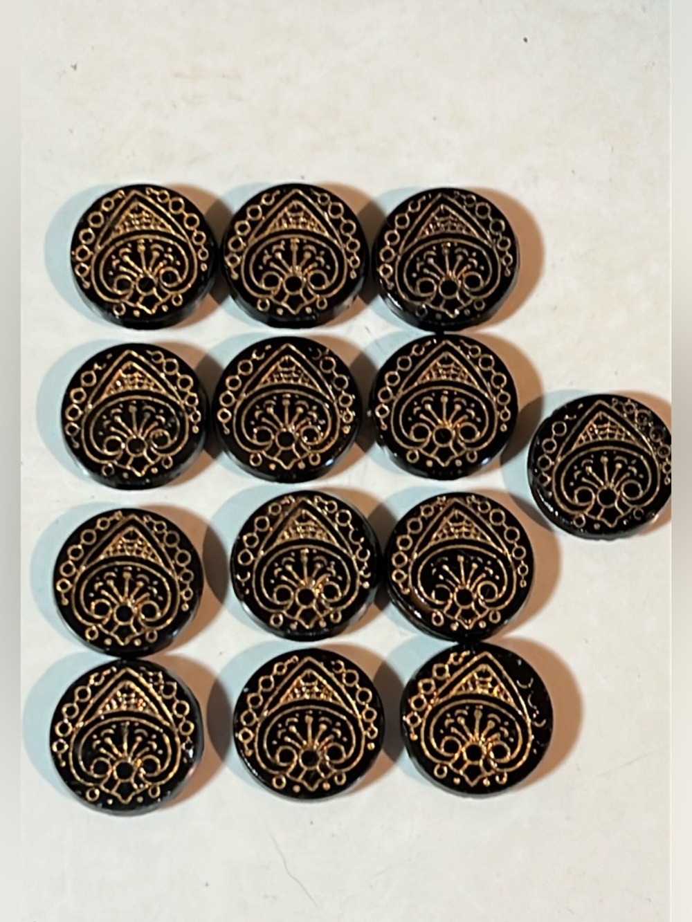 13 black glass gold luster buttons, self shanks Victorian Era